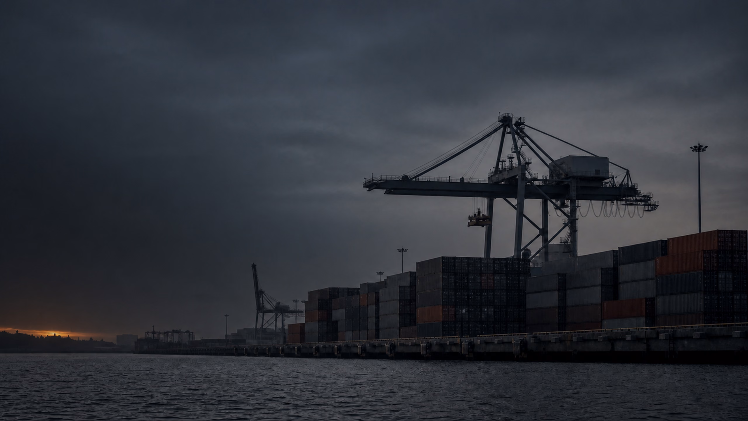 Containers stacked at an Indonesian export port at first light