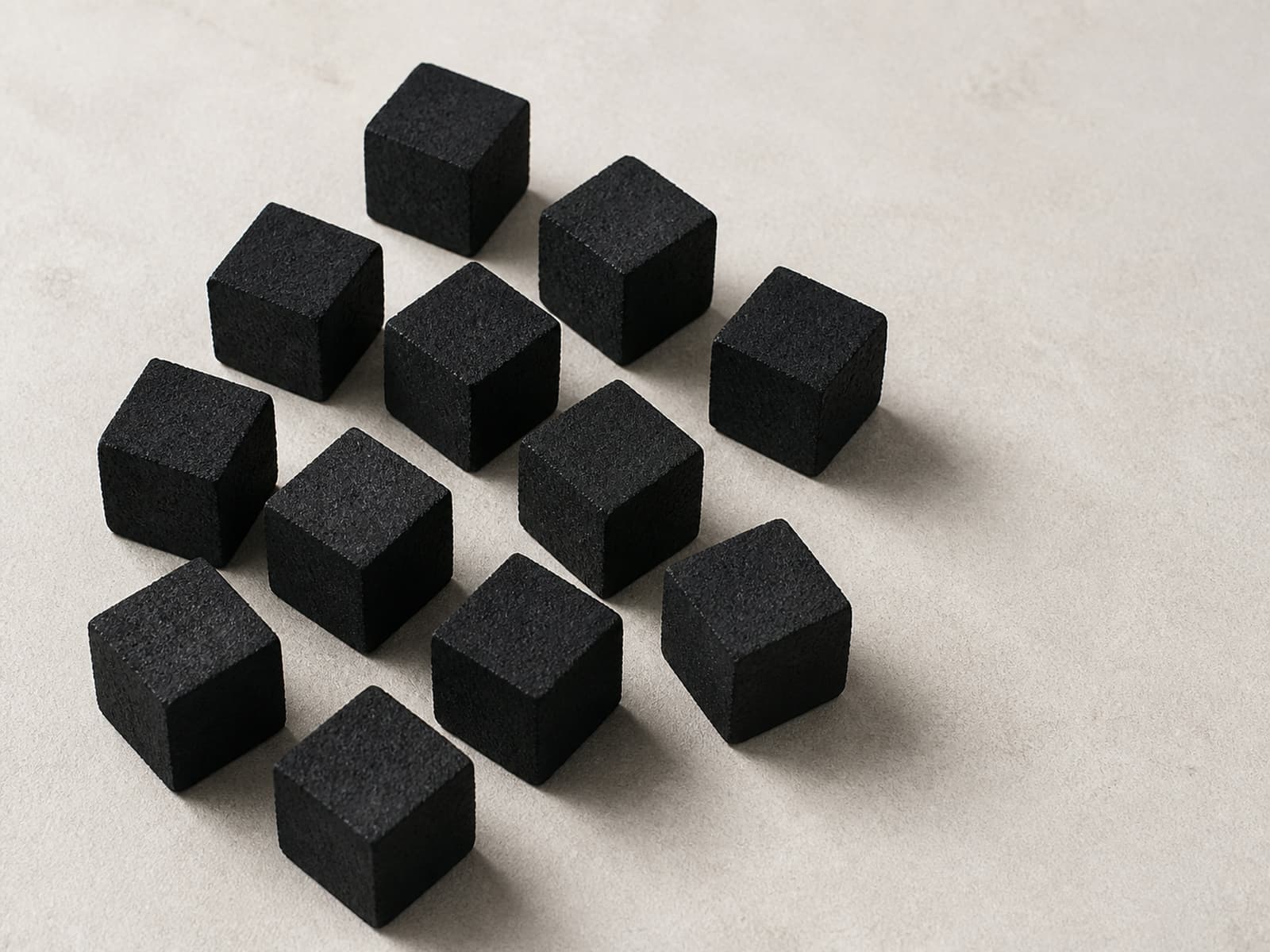 Cube-shaped coconut shell charcoal briquettes for shisha